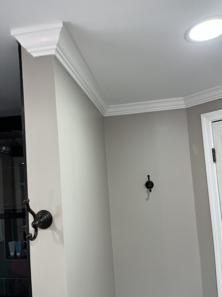 Crown molding installed in a bathroom by Tussel Home Remodeling in Brunswick, Ohio